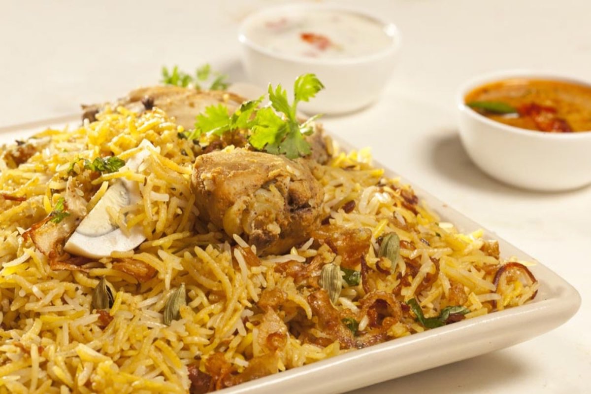 Golconda Chimney: chicken biryani platter with raita and curry. Photo from their website.