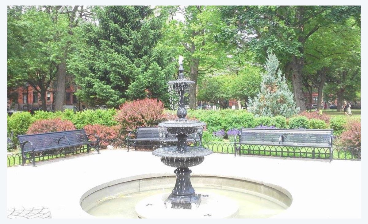 Hamilton Park: ornate iron fountain with benches amid park greenery. Photo from their website.