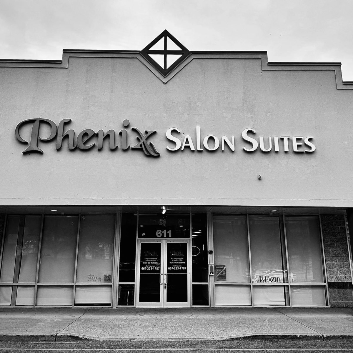 Newport Cuts: the salon suites entrance sign. Photo from their website.