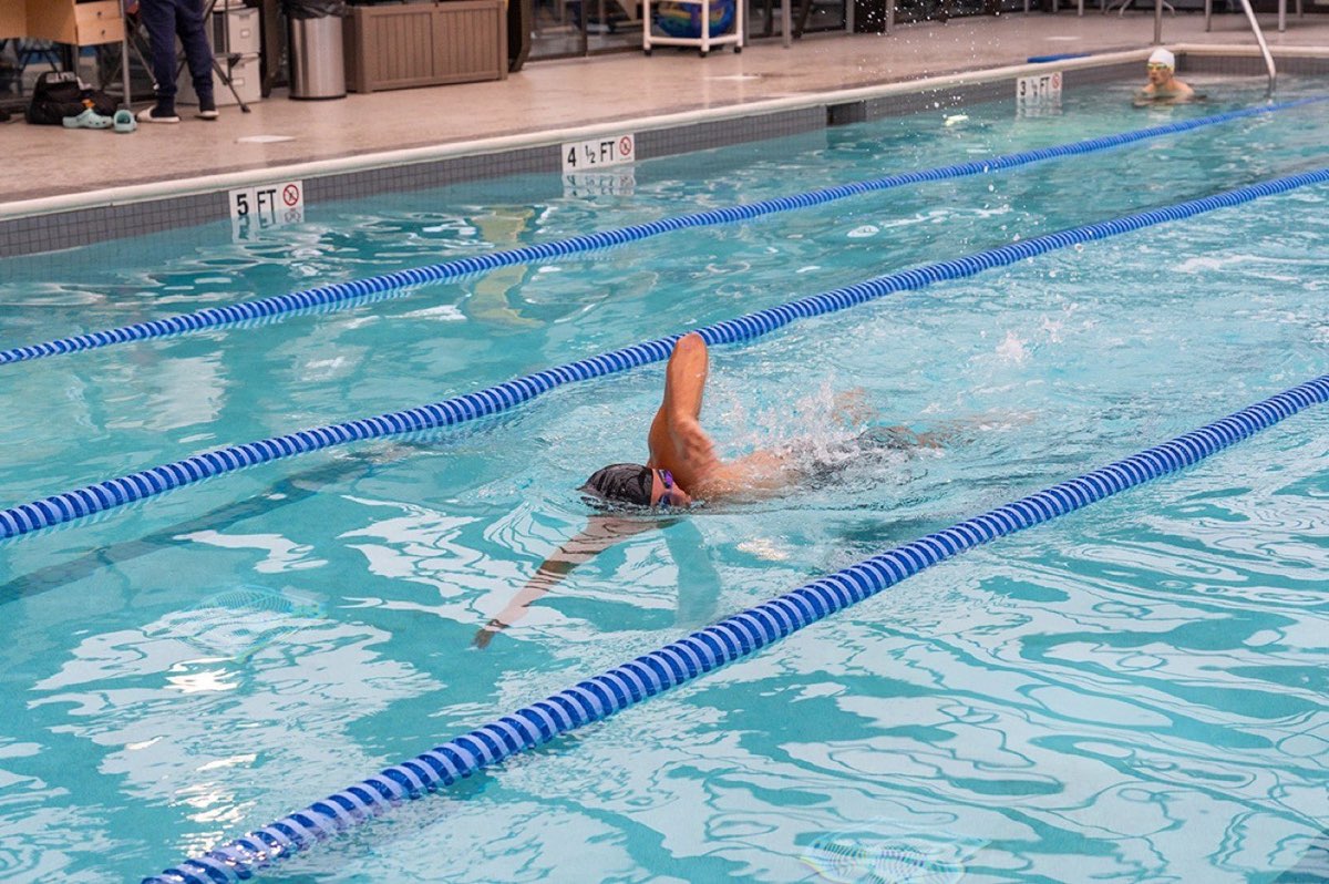 Newport Swim & Fitness: a swimmer doing laps in the indoor pool. Photo from their website.