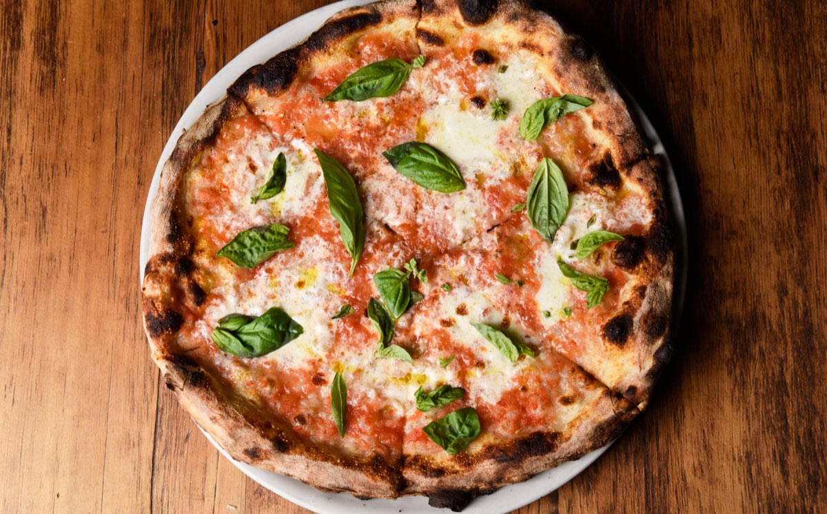 Razza: wood-fired Margherita pizza with fresh basil. Photo from their website.