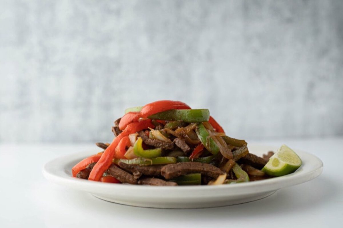 Rumba's Cafe: steak fajita platter with peppers and onions. Photo from their website.