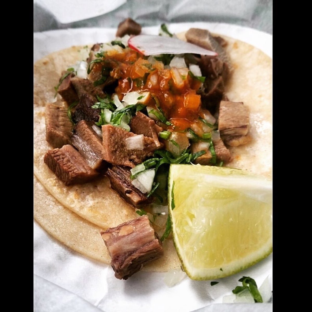 Taqueria Downtown: steak taco with cilantro, onion and lime. Photo from their website.